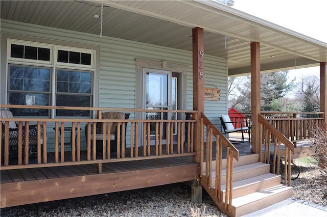 925 Bluff View Cir, Chippewa Falls, WI 54729 - wooden terrace with covered porch