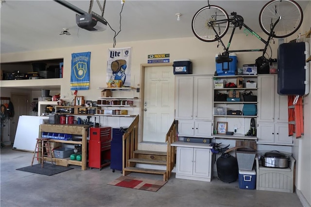925 Bluff View Cir, Chippewa Falls, WI 54729 - garage featuring a garage door opener