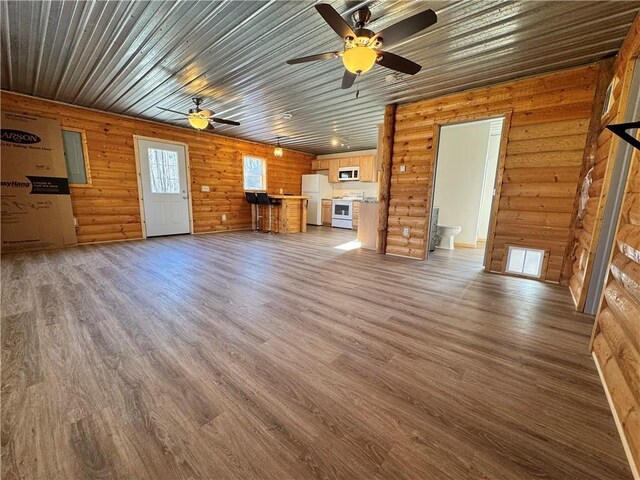 4607N Koeppler Rd, Ojibwa, WI 54862 - unfurnished living room featuring a ceiling fan and dark wood-style flooring