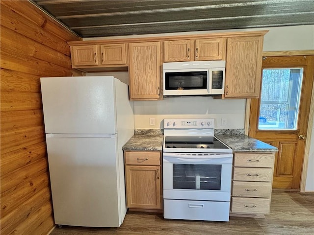 4607N Koeppler Rd, Ojibwa, WI 54862 - kitchen featuring white appliances and wood finished floors