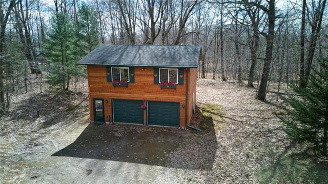 garage with driveway