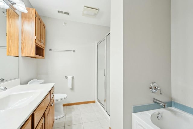 bathroom with a bathing tub, vanity, visible vents, and a stall shower