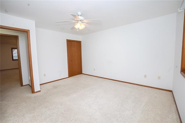 1613 Chumas Dr, Eau Claire, WI 54701 - spare room with carpet floors, baseboards, and ceiling fan