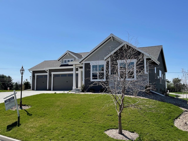 W255S5377 Primrose Ln, Waukesha, WI 53189 - craftsman inspired home with a front lawn, driveway, and a garage
