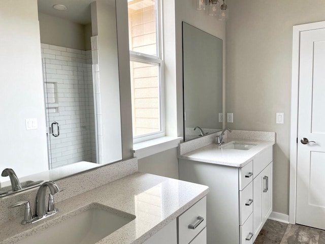 W255S5377 Primrose Ln, Waukesha, WI 53189 - bathroom featuring two vanities, a sink, and a shower stall