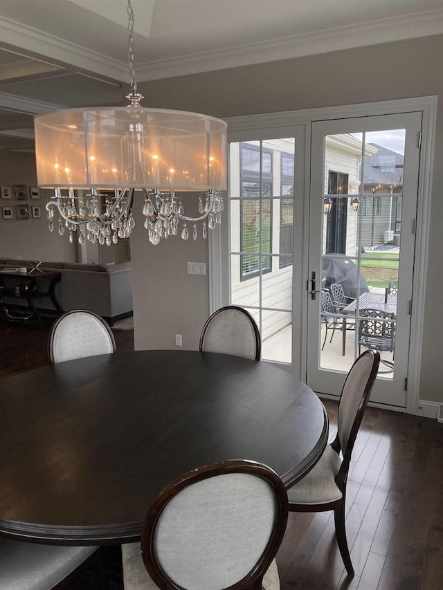 4922 Saint Annes Dr, Waunakee, WI 53597 - dining space featuring wood-type flooring, ornamental molding, a notable chandelier, and french doors