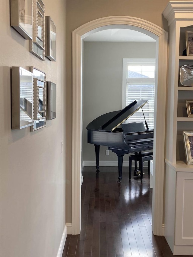 4922 Saint Annes Dr, Waunakee, WI 53597 - hallway with arched walkways, baseboards, and dark wood finished floors