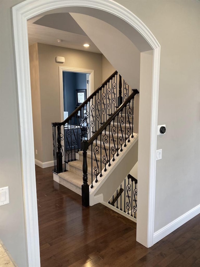 4922 Saint Annes Dr, Waunakee, WI 53597 - staircase featuring wood-type flooring, arched walkways, baseboards, and recessed lighting