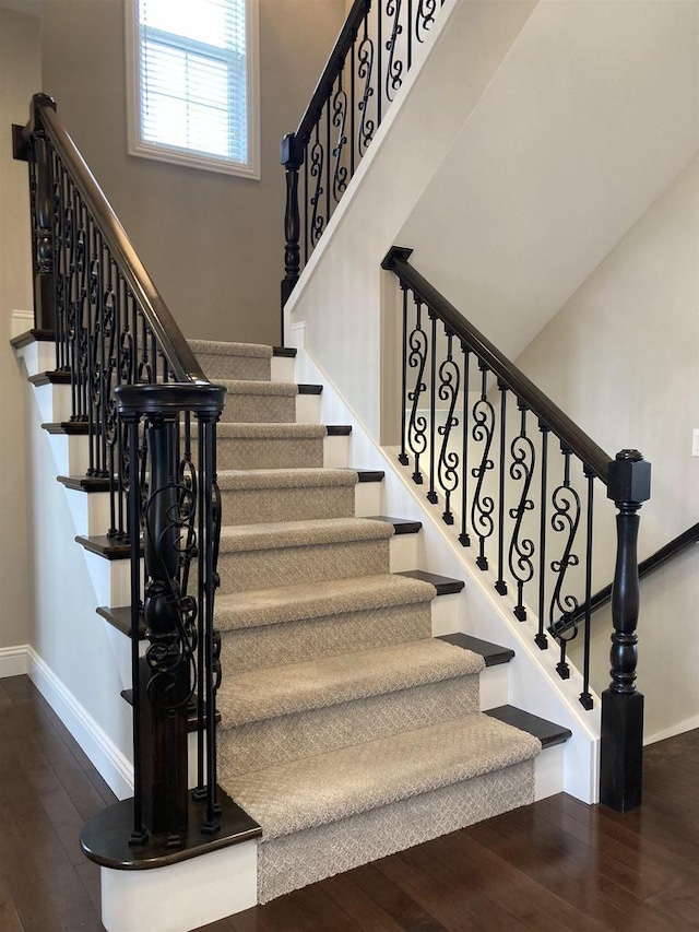 4922 Saint Annes Dr, Waunakee, WI 53597 - stairway with baseboards and wood finished floors
