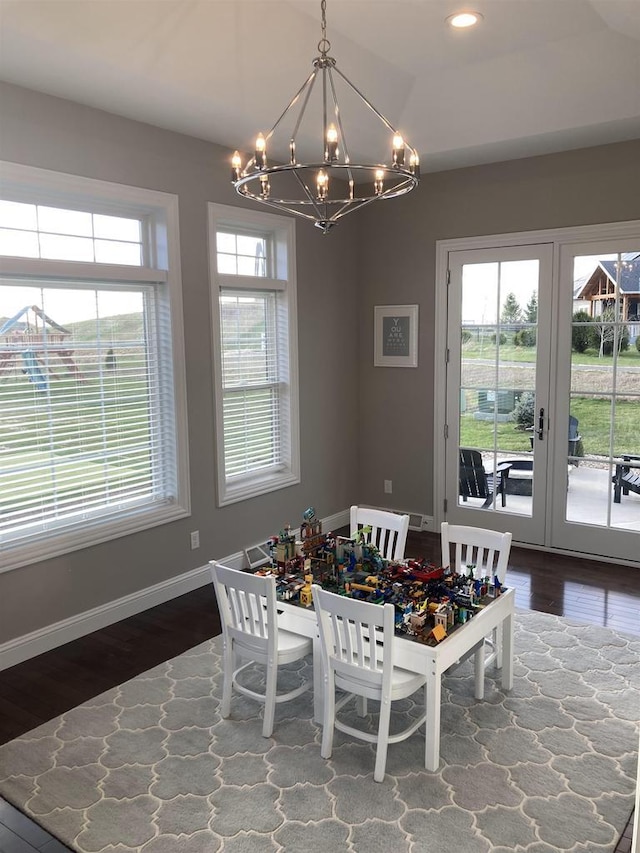 4922 Saint Annes Dr, Waunakee, WI 53597 - dining room featuring an inviting chandelier, baseboards, dark wood-style floors, recessed lighting, and french doors