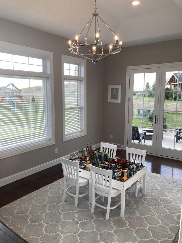 4922 Saint Annes Dr, Waunakee, WI 53597 - dining room with baseboards, recessed lighting, french doors, dark wood finished floors, and a notable chandelier