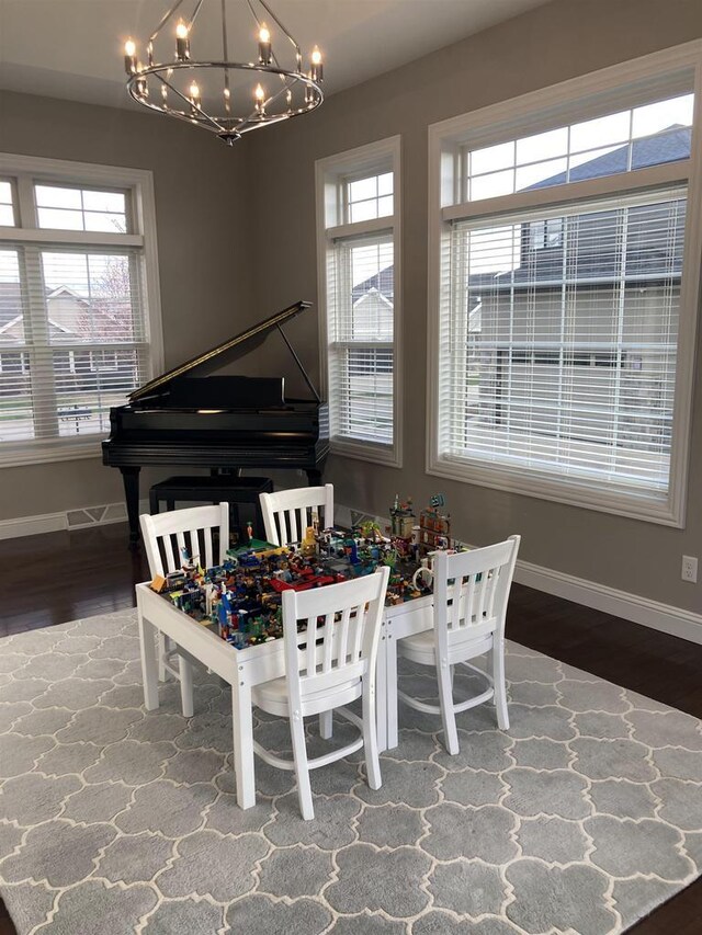 4922 Saint Annes Dr, Waunakee, WI 53597 - interior space with baseboards, a chandelier, and wood finished floors