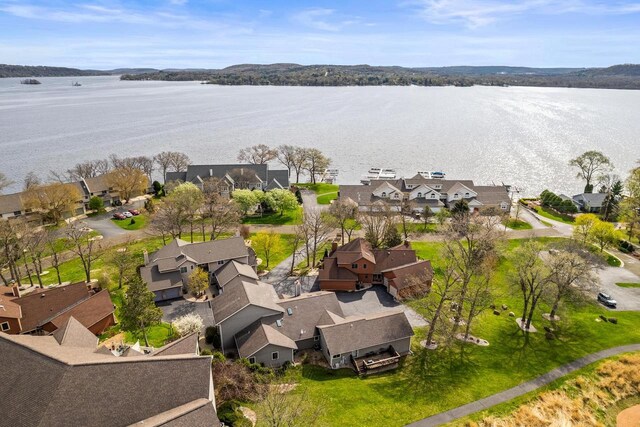 bird's eye view featuring a residential view and a water view