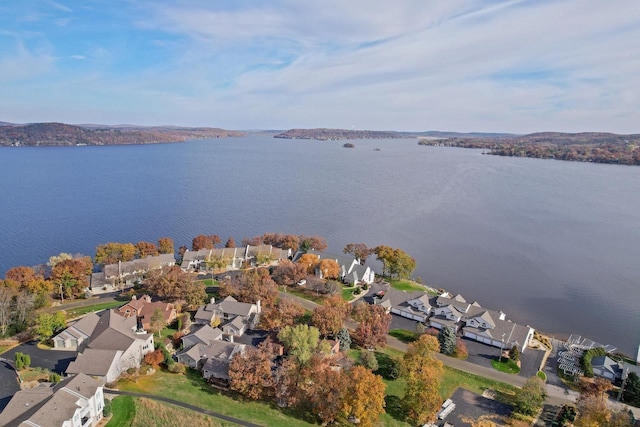 birds eye view of property featuring a residential view and a water view