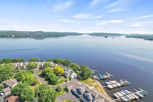 birds eye view of property featuring a water view and a residential view