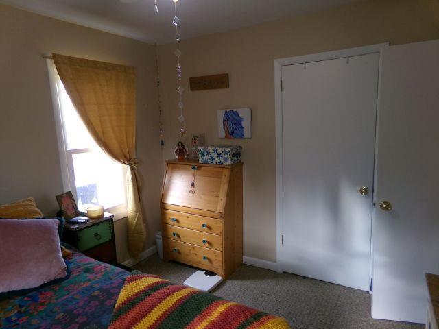 bedroom featuring carpet