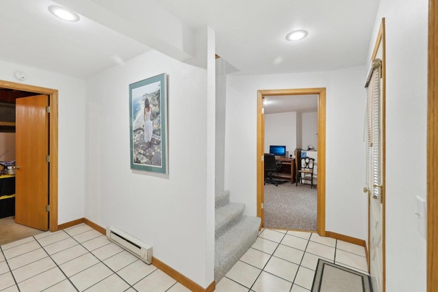 N7589 Lakeside Dr, Portage, WI 53901 - hall featuring a baseboard radiator, light tile patterned floors, light colored carpet, baseboards, and recessed lighting