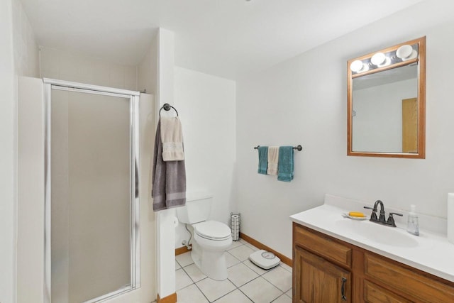 N7589 Lakeside Dr, Portage, WI 53901 - full bathroom featuring a shower stall, tile patterned floors, vanity, baseboards, and toilet