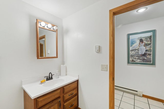 N7589 Lakeside Dr, Portage, WI 53901 - bathroom with a baseboard heating unit, tile patterned flooring, and vanity