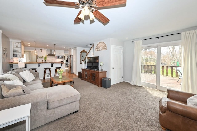 living room featuring a ceiling fan, carpet flooring, and recessed lighting
