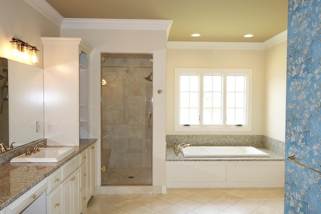 bathroom featuring a bath, vanity, ornamental molding, and a stall shower