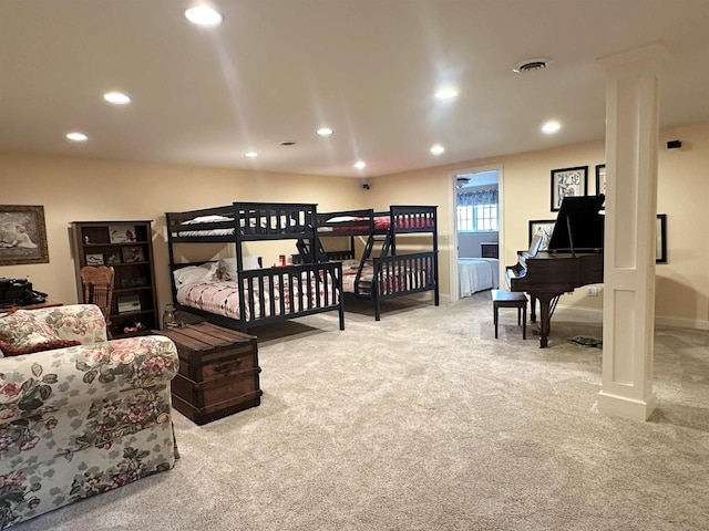 carpeted bedroom featuring recessed lighting, visible vents, and baseboards