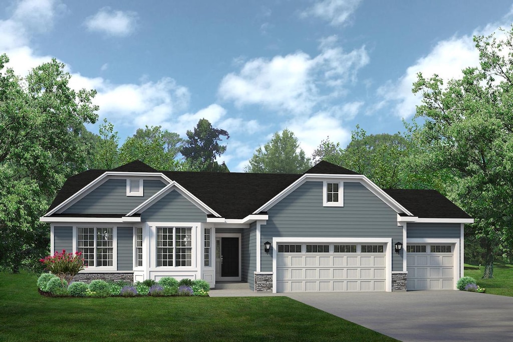 85 York St Unit Lt3, Union Grove, WI 53182 - traditional-style home featuring stone siding, a garage, concrete driveway, and a front lawn