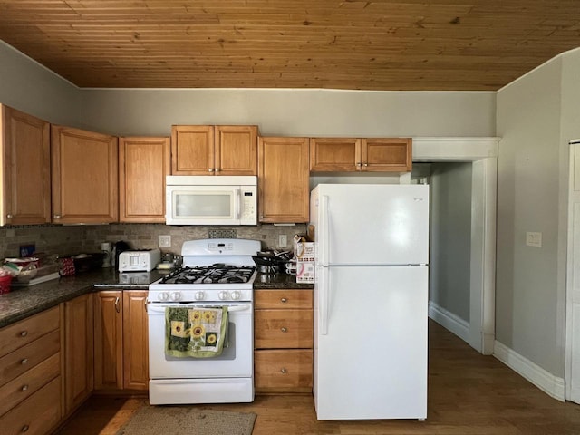 201 Bonito St, Walworth, WI 53184 - kitchen featuring wood ceiling, dark countertops, white appliances, and backsplash