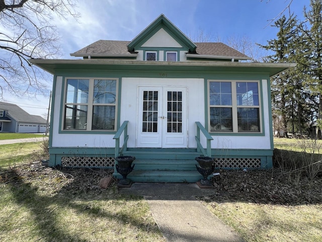 201 Bonito St, Walworth, WI 53184 - back of house featuring french doors, roof with shingles, and entry steps