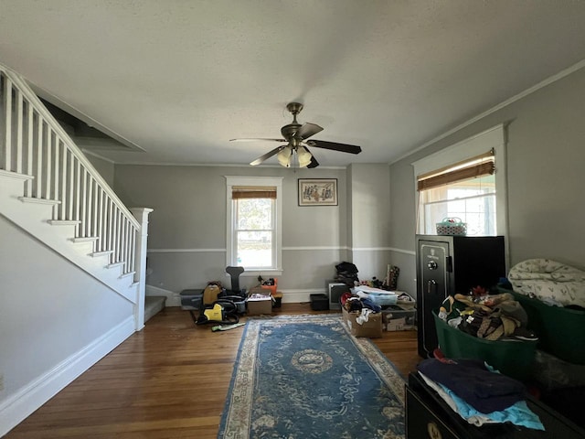 201 Bonito St, Walworth, WI 53184 - interior space with baseboards, a ceiling fan, wood finished floors, and stairs