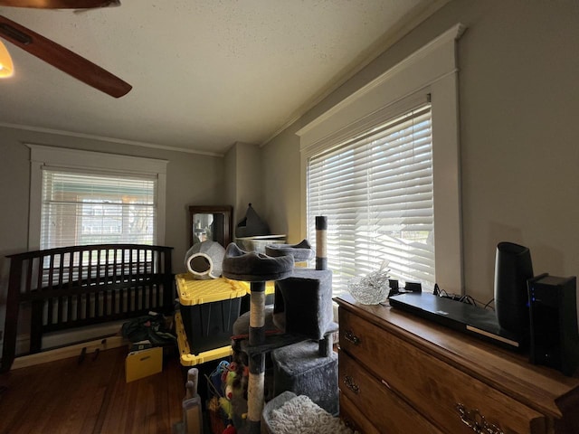 201 Bonito St, Walworth, WI 53184 - bedroom featuring a ceiling fan, wood finished floors, and crown molding