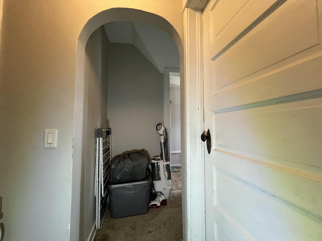 201 Bonito St, Walworth, WI 53184 - hallway featuring arched walkways and carpet flooring