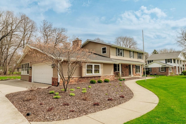 traditional-style house with a front yard, a garage, brick siding, driveway, and a chimney