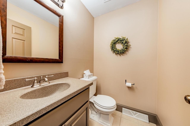 half bathroom featuring tile patterned floors, toilet, vanity, baseboards, and visible vents