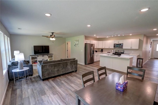 10230 Olker Rd, Hayward, WI 54843 - dining room featuring a ceiling fan, light wood finished floors, baseboards, visible vents, and recessed lighting