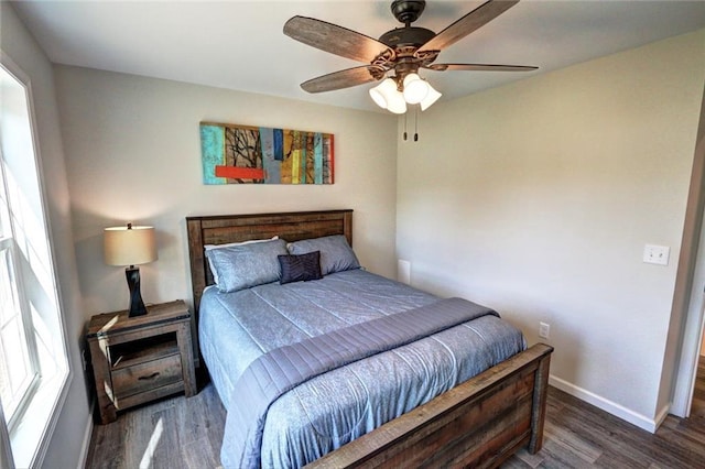 10230 Olker Rd, Hayward, WI 54843 - bedroom featuring ceiling fan, baseboards, and wood finished floors
