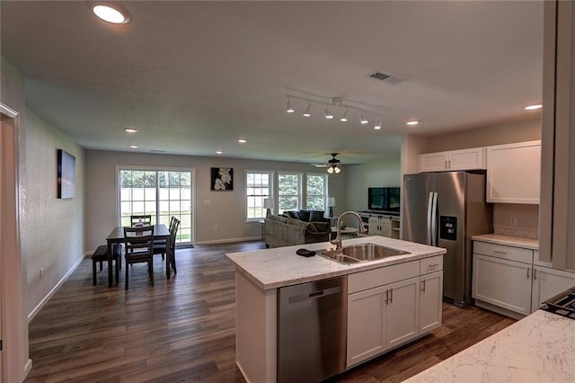 10230 Olker Rd, Hayward, WI 54843 - kitchen with stainless steel appliances, visible vents, a sink, and recessed lighting