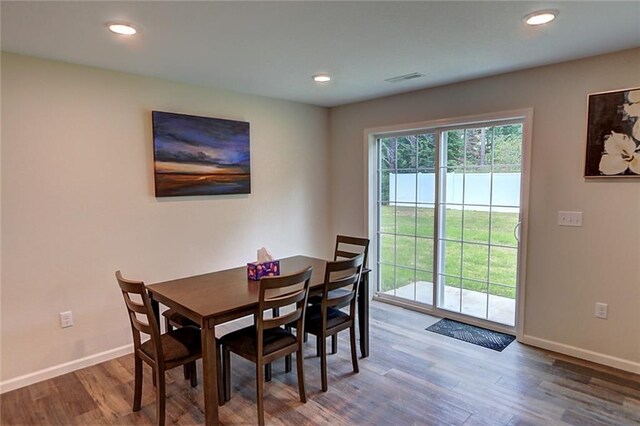 10230 Olker Rd, Hayward, WI 54843 - dining area with baseboards, wood finished floors, and recessed lighting