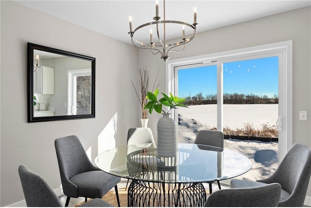 30410 72nd Avenue Way, Cannon Falls, MN 55009 - dining area featuring a chandelier, plenty of natural light, and baseboards