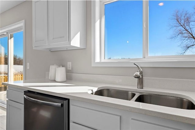 30410 72nd Avenue Way, Cannon Falls, MN 55009 - kitchen featuring light countertops, stainless steel dishwasher, and a sink