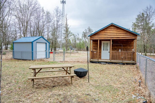 W4742 26th St, Necedah, WI 54646 - view of shed with a fenced backyard