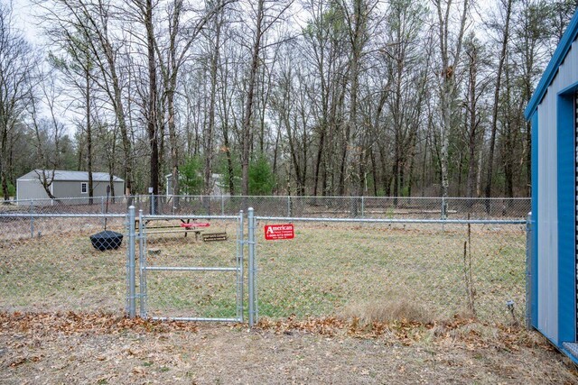 W4742 26th St, Necedah, WI 54646 - view of yard featuring a gate and fence