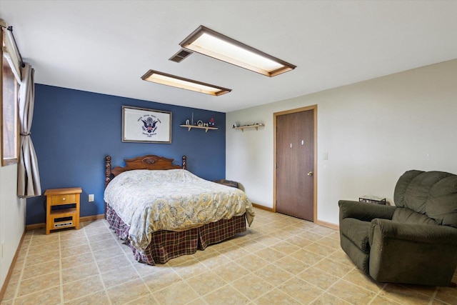 bedroom featuring baseboards