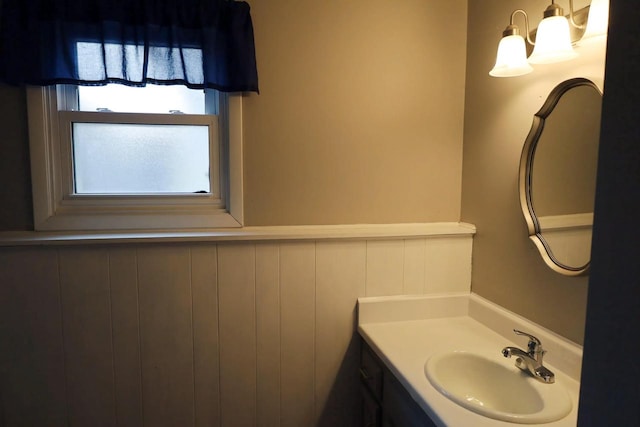 2282 Collier Ct, Green Bay, WI 54311 - bathroom featuring wainscoting and vanity