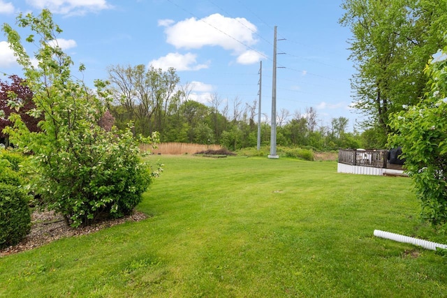 2282 Collier Ct, Green Bay, WI 54311 - view of green lawn with a wooden deck