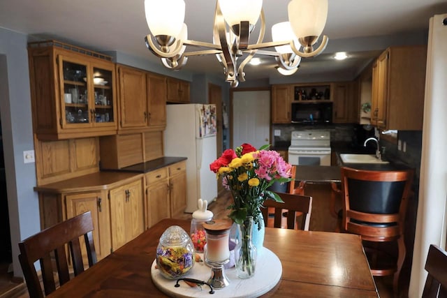 2282 Collier Ct, Green Bay, WI 54311 - dining area featuring a chandelier