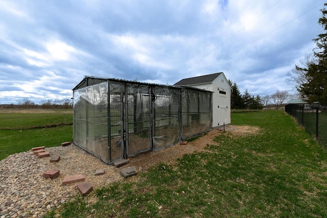 414 State Road 26, Oshkosh, WI 54904 - view of outdoor structure featuring fence and an outbuilding