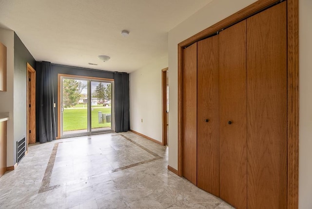 interior space with baseboards