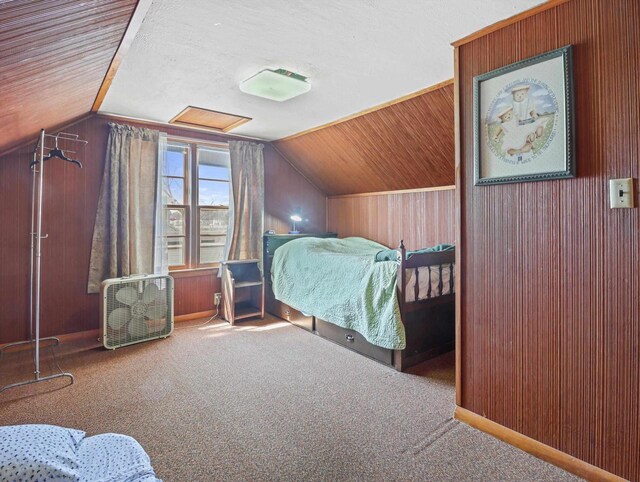 1802 S Ridge Rd, Green Bay, WI 54304 - bedroom featuring carpet floors, vaulted ceiling, and wooden walls