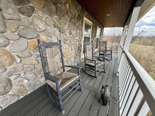 wooden deck featuring a porch